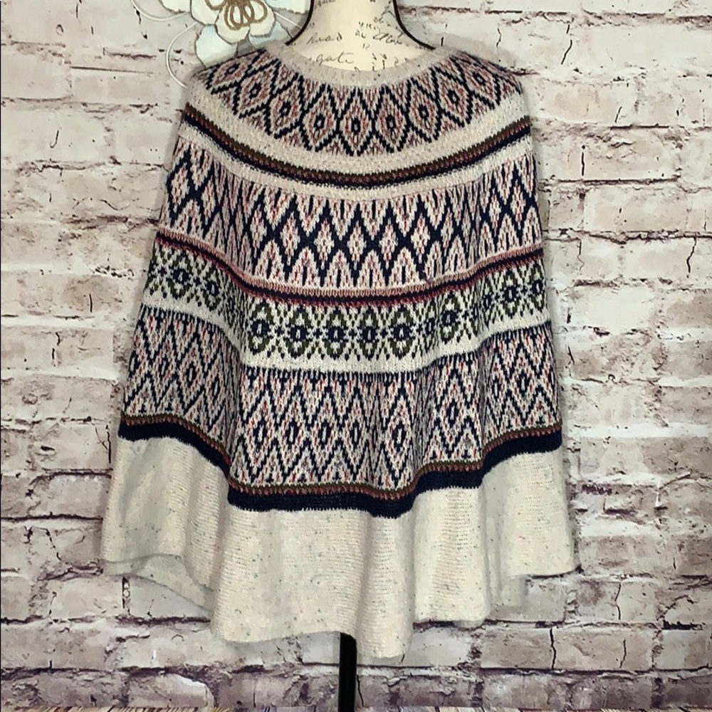 RUFF HEWN PONCHO